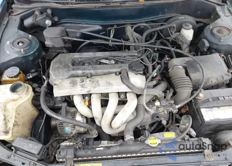 1999 Toyota Corolla Le z USA, uszkodzony, nr VIN 2T1BR12E9XC232710